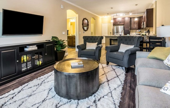 Living Room With Kitchen View at The Oasis at Lake Bennet, Ocoee, 34761