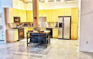 Live in the Heart of the Downtown Loft District! Dorsa Lofts #402