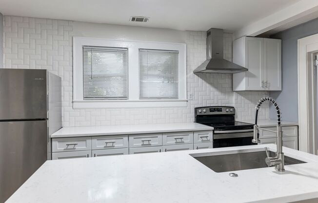 Dive into City Living: Spacious 4 Bed/2.5 Bath Home!