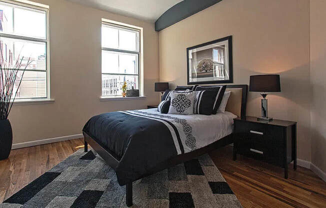 Bedroom With Expansive Windows at Grand Adams Apartment Owner LLC, New Jersey