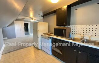 705 E 18 AVE