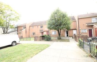 Renovated townhome with central air and off-street parking