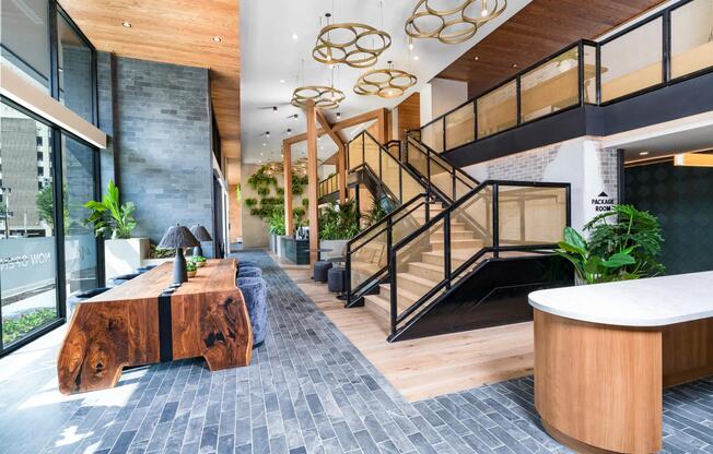 Make a grand entrance at Modera St. Paul, where the striking lobby blends natural textures with upscale design in the heart of Dallas.