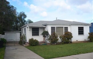 Single story house with large yard
