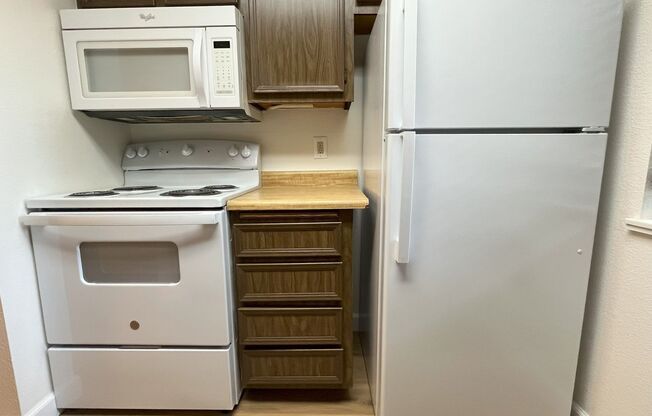 Charming Condo with Creek Views, Laminate Flooring, and Prime Location Near Washington Square!