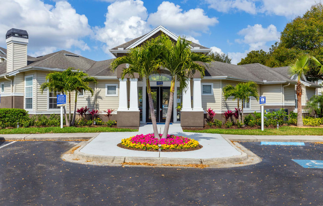a house with a palm tree in front of it