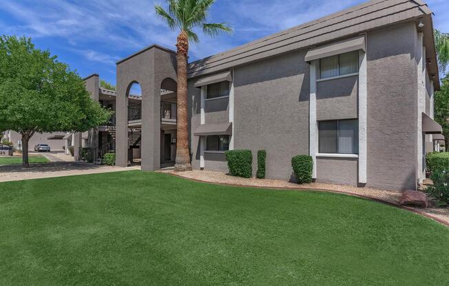 a large lawn in front of a house