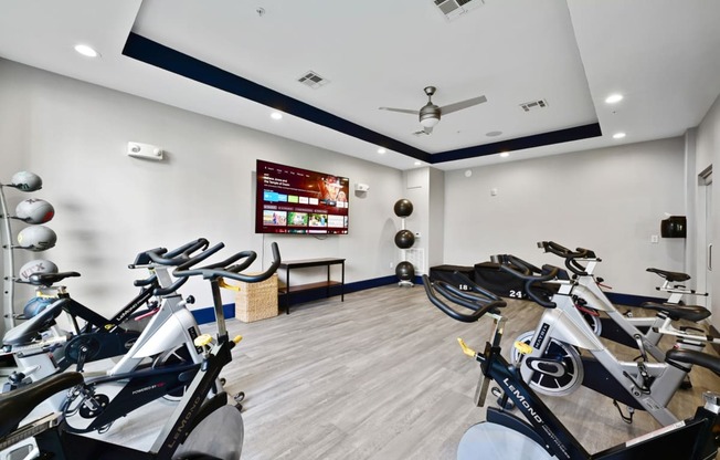 Spacious spin cycle studio for group cycling classes at Harlow River Oaks apartments in Houston, TX