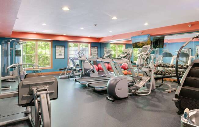 Laurel East End Apartments in Golden Valley, MN photo of a gym with various cardio machines and weights