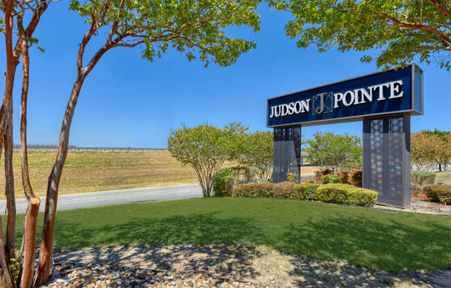 a view of the sign at the entrance to the lubbock pointe apartments