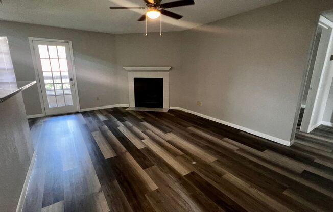 3/2 Regency Gardens 1st Floor Condo with New Plank Fooring, Stainless Appliances, and Fresh Paint!