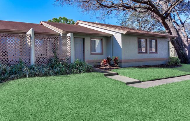 a large lawn in front of a house