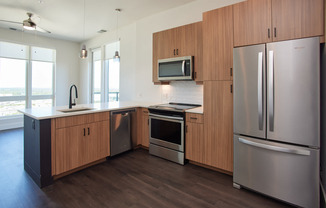 Kitchen with Stainless Steel Appliances and Hard Surface Flooring