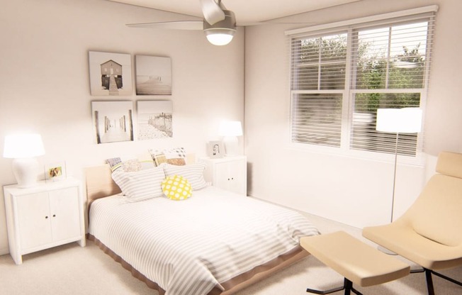 a bedroom with a bed and a chair in front of a window at Brownstones at Palisade Park Townhomes, Broomfield, 80023