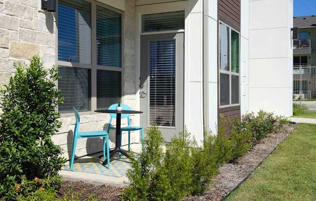 a window display with a reflection of people and plants