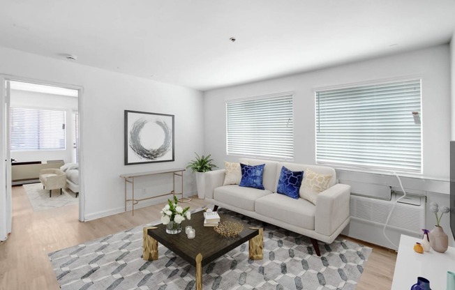 a living room with a couch and a coffee table