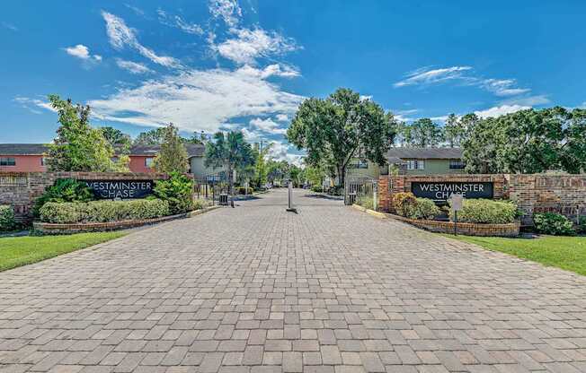 A brick pathway leads to a building with a sign that reads "Westminster".