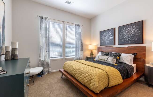 our apartments offer a bedroom with a king sized bed at Century University City, Charlotte, NC