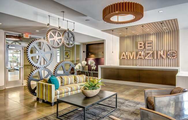 a lobby with couches and a coffee table