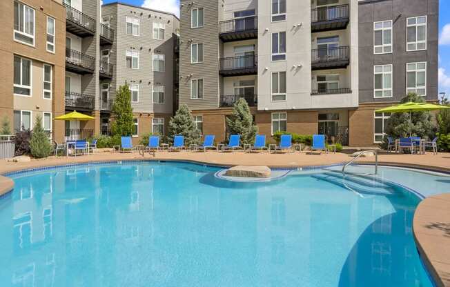 our apartments have a large pool with lounge chairs