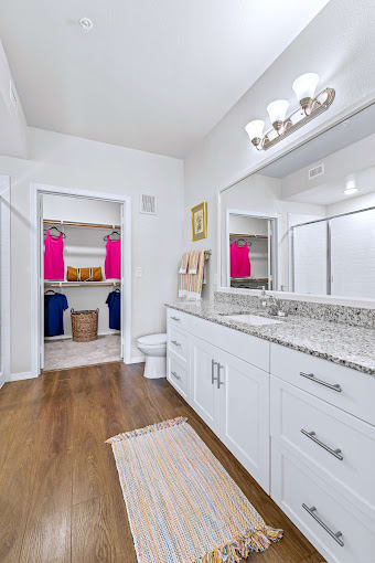 Bathroom With Vanity Lights at Mariposa at Harris Road Arlington 55+ Apartments, Arlington