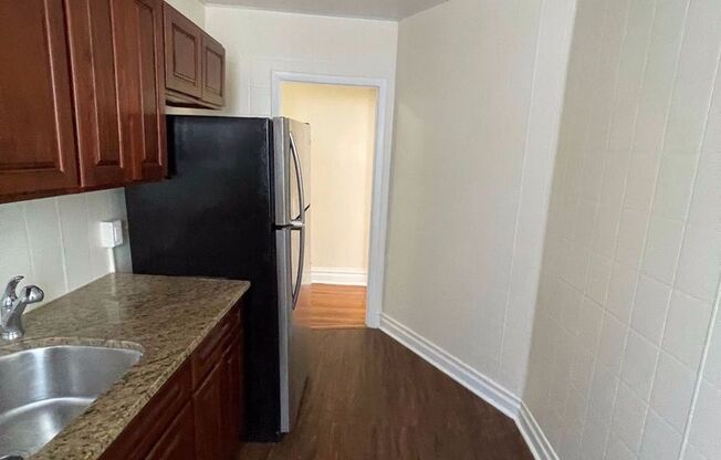 1111-Trefoil Manor, LLC