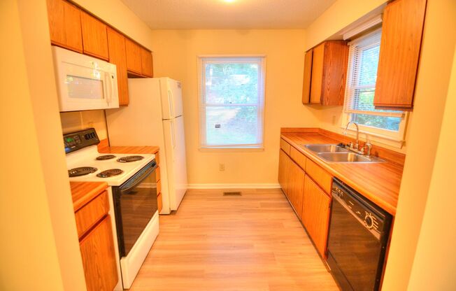 AVAILABLE AUGUST 2025 - Walk to Downtown Carrboro From This End Unit Townhome!