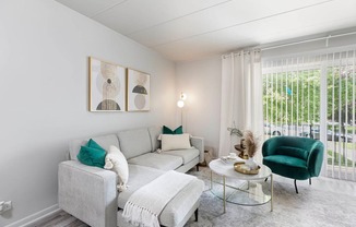 a living room with a couch and a table