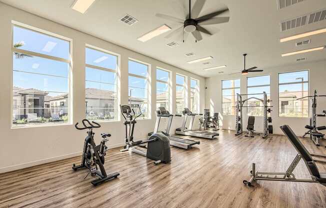 Gym with cardio equipment and a large window at Hampton Meridian, Apache Junction