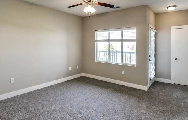 Living Room with natural light at Tamarin Ridge in Lincoln, NE