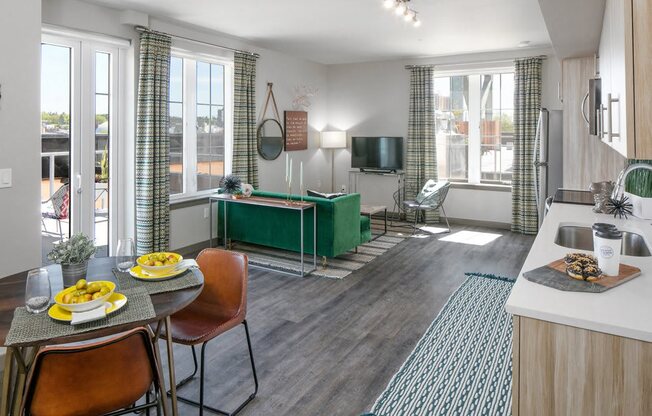 Staged interior with view of dining and living