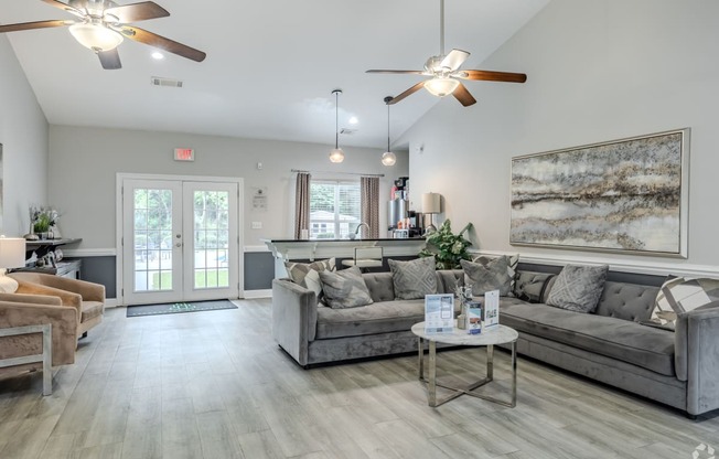 a living room with couches and a coffee table