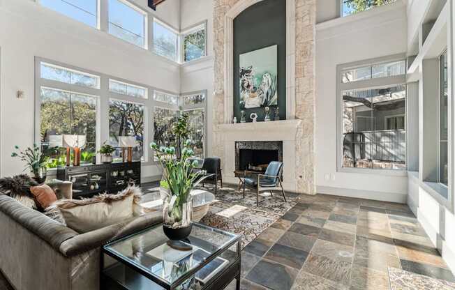 A living room with a fireplace and a couch.