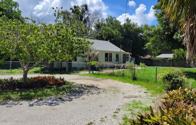 Annual unfurnished updated 2/1 SFH in Sarasota with large fenced in yard.