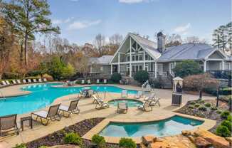 A large house with a pool in the backyard.