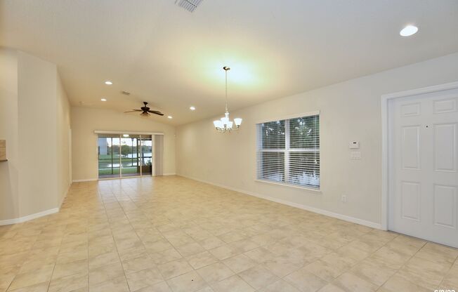 Beautiful 3/2 Corner Duplex with Water View in Highly Sought After Gated Community of Village Walk - Lake Nona!