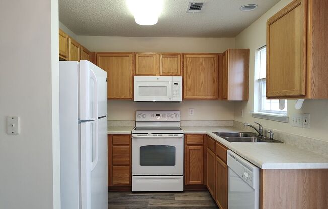 Pristine, move in ready Townhome located in the Popular Old Stone Crossing Community!