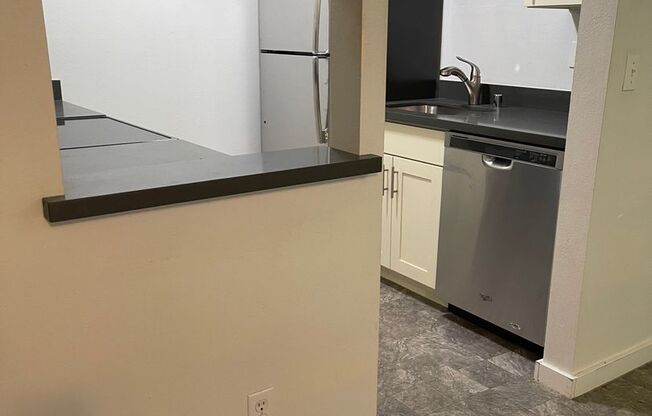 Ground Floor unit with a nice upgrade and small fenced Patio