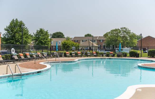 our apartments offer a swimming pool with chaise lounge chairs