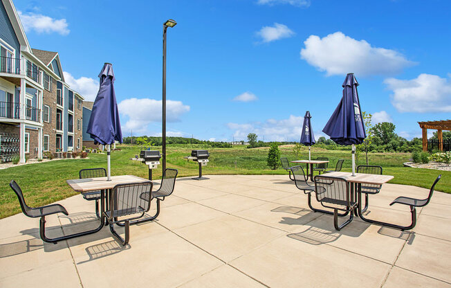 Grilling Stations with Seating at Meadowbrooke Apartment Homes in Grand Rapids, MI 49512