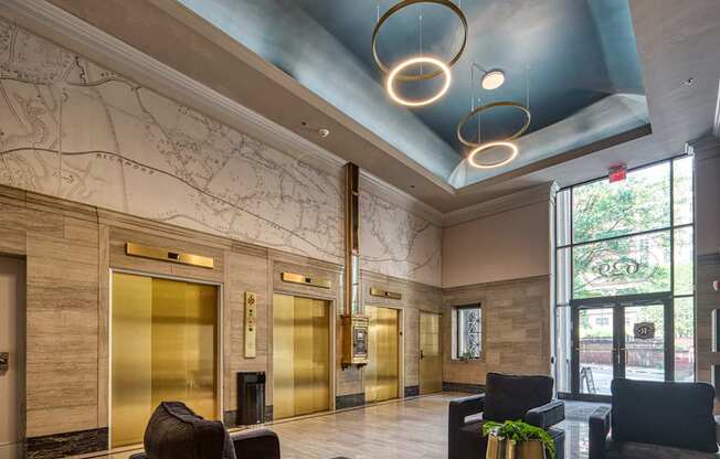 A large room with a blue ceiling and a map on the wall.