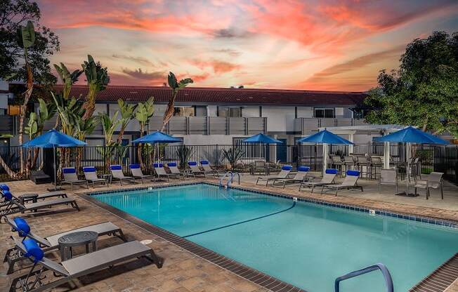 Stone Arbor Pool Deck with Lounge Chairs