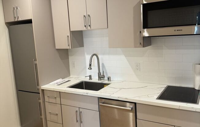 Newly Renovated 800 Sq Ft 2BR/1BA Garden-Level Unit in Parkside with Private Entrance & Backyard Access