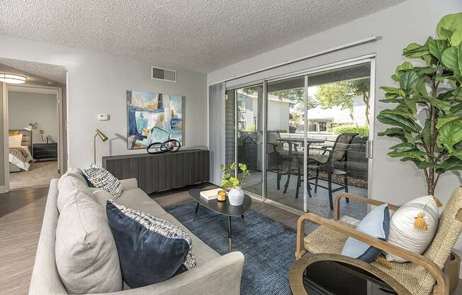 Living room with patio l Vue at the Lake in Sacramento