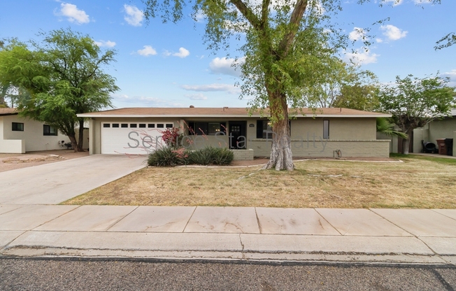 6026 E OSBORN RD