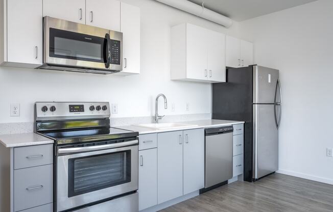 The Lenox | Kitchen Area with Stainless Steal Appliances