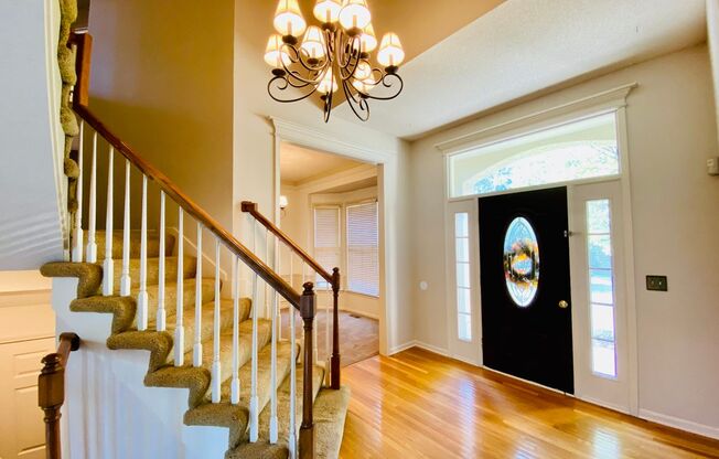 {8514}  Village of Kensington + Finished Basement + 3 Car Garage + Community Pool + Blue Valley Schools!