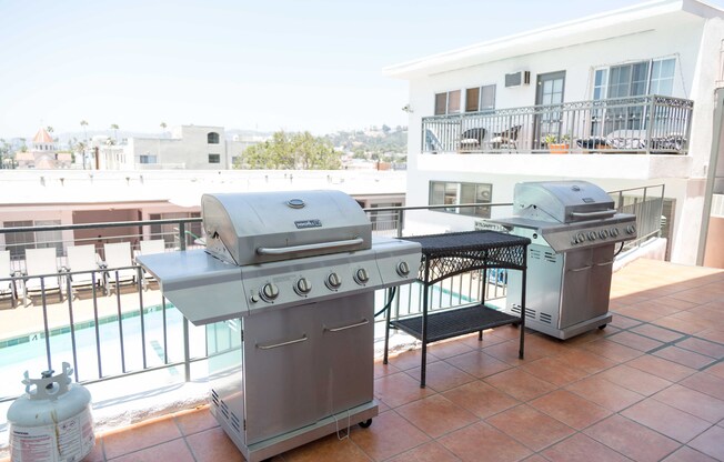 BBQ grills facing pool