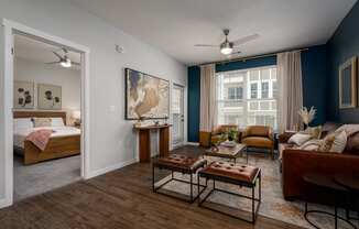 a living room with a couch and a table