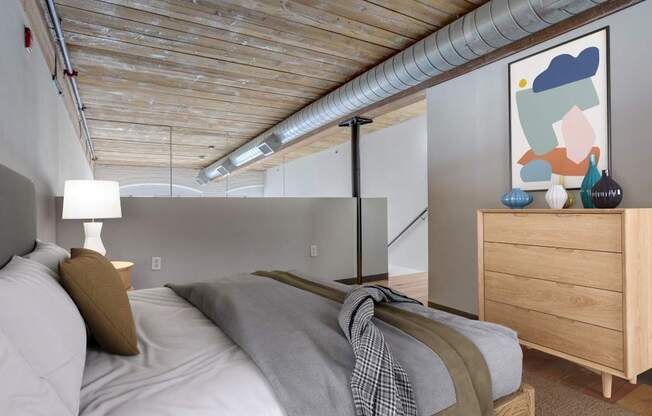 furnished loft style bedroom